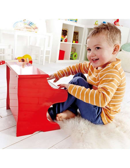 Piano de madera rojo